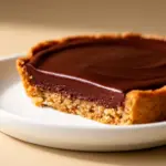 vegane Schoko-Tarte mit Kokosboden - featured image